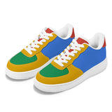 Colorful sneakers with a blue, yellow, and green design on a white background